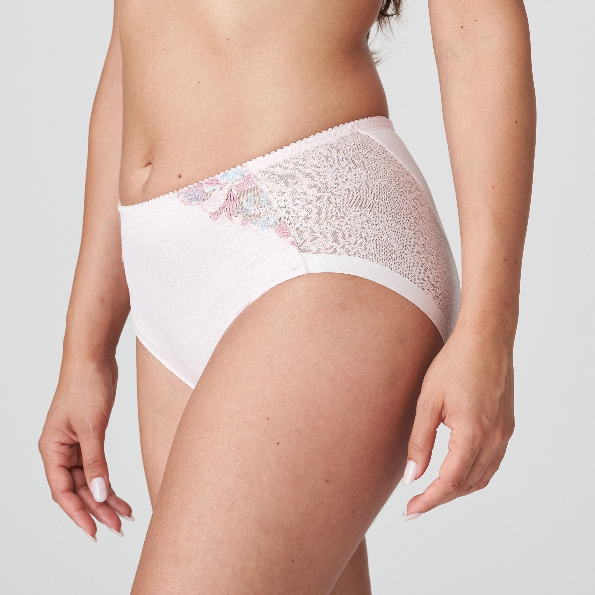 Side view of Mohala Full Briefs pastel pink from The Foundation, highlighting the seamless finish and feminine lace detail