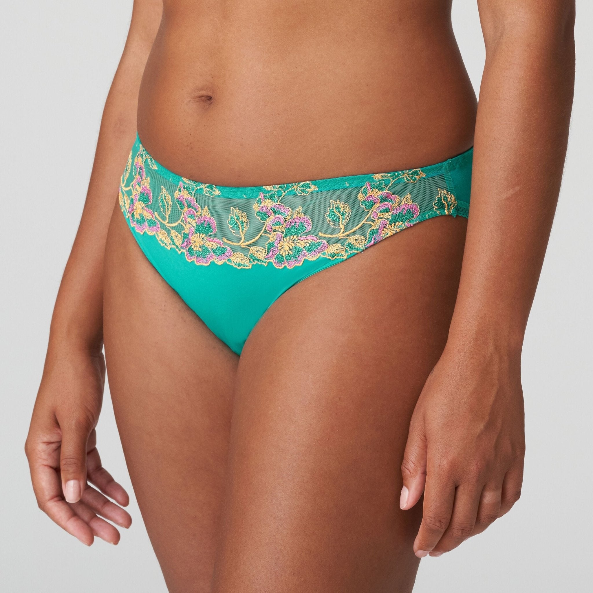 Side angle of Lenca Rio Briefs Sunny Teal from The Foundation, highlighting the soft microfiber fabric and tropical teal shade