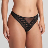 Model wearing Jhana Thong Black from The Foundation, highlighting flattering cut and elegant lace design on the front