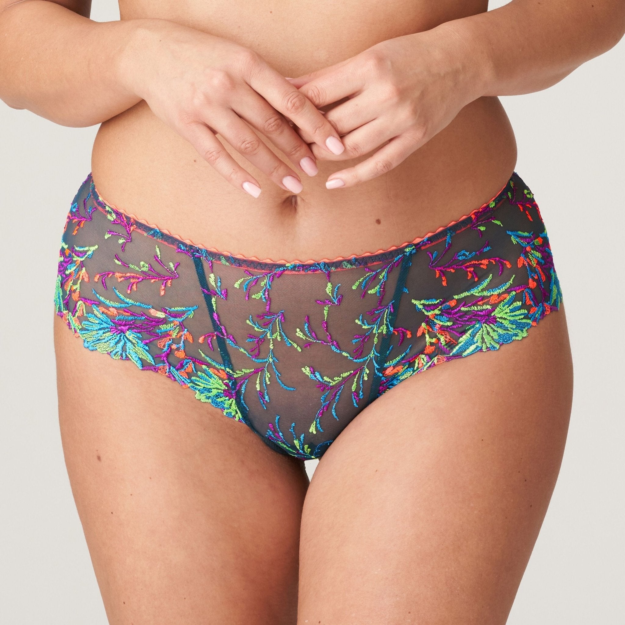 Las Salinas Empire Green Thong by PrimaDonna – front close-up showing colourful neon embroidery over sheer mesh.