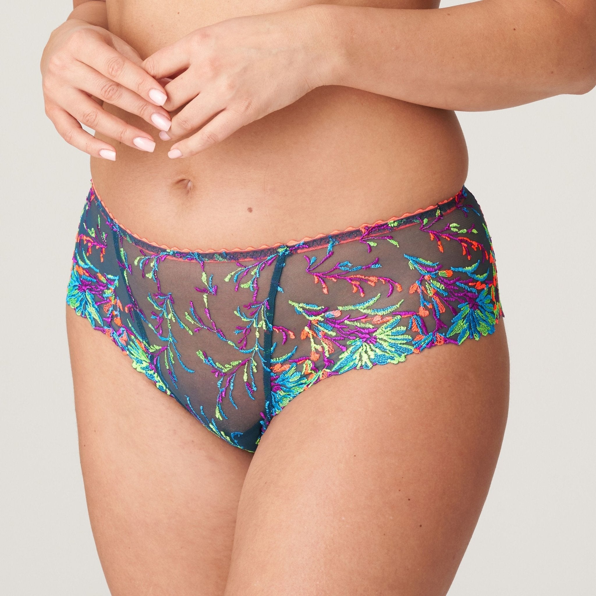 Side view of PrimaDonna’s Las Salinas Thong – mid-rise fit with vivid multicolour floral embroidery and soft waistband.