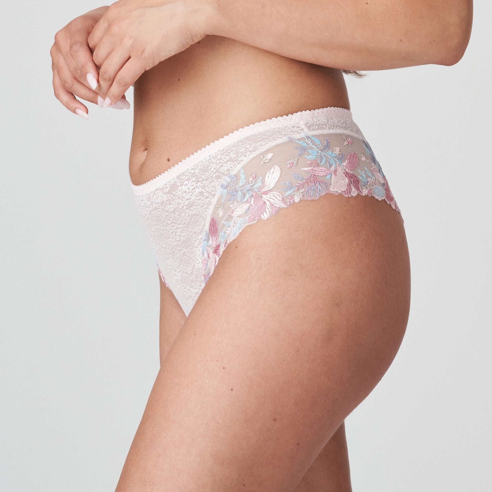 Side view of Mohala Luxury Thong Brief pastel pink from The Foundation, highlighting elegant lacework and a comfortable fit