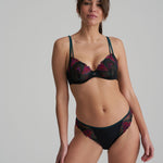 Marie Jo Yoly Rio Brief in Jewel Green with shimmery fabric and floral embroidery, featuring a broader back band for a smooth fit.