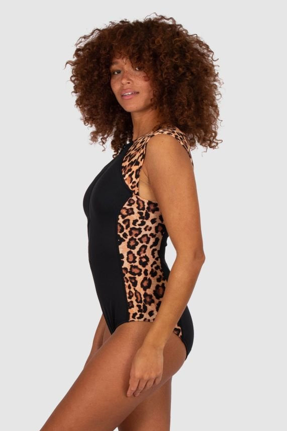 Side profile of the Zambia Surfsuit Mocha by Baku, showing contrast panel design and curve-hugging fit, stocked at The Foundation.