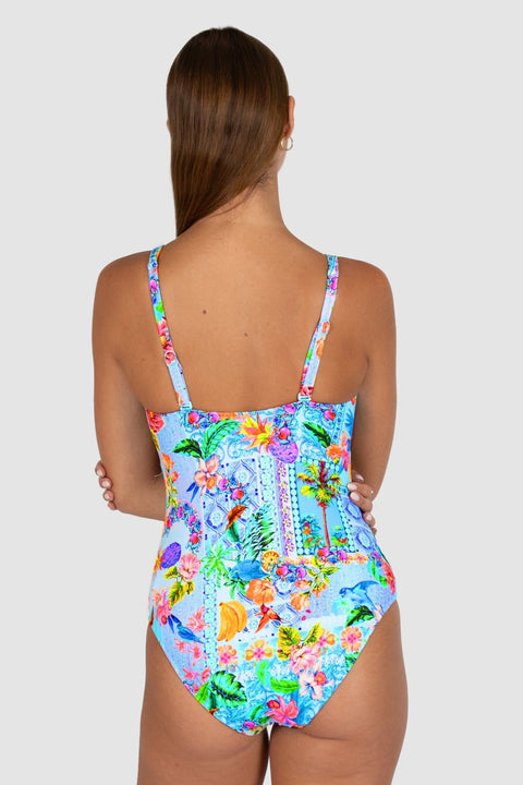Woman wearing a colorful swimsuit with a white background back view Baku Sardinia Collection Ocean