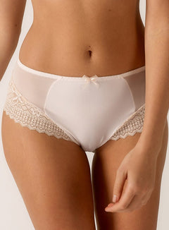 Close-up of intricate lace on the gold Empreinte Melody Brief, highlighting the quality craftsmanship stocked by The Foundation.