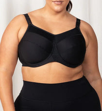 Front view of Triumph Triaction Ultra W Sports Bra in Black, showing full coverage and supportive fit