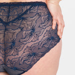Close up  back view of Samanta Nyks Midi Brief Sapphire—lace mesh back design seen on model.