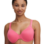 front view of Model wearing the Pila Spacer Bra in Love Pink/Peach, showcasing a full-coverage, breathable fit – The Foundation.