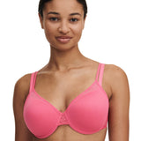 front view of Model wearing the Pila Spacer Bra in Love Pink/Peach, showcasing a full-coverage, breathable fit – The Foundation.