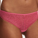 close up of the Pila Tanga Brief in Love Pink/Peach showing delicate lace and flattering low-rise cut – The Foundation.