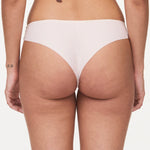 Back view of Pila Tanga Brief in Talc with ultra-flat finishes and soft knit fabric – part of The Foundation's collection.