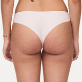 Back view of Pila Tanga Brief in Talc with ultra-flat finishes and soft knit fabric – part of The Foundation's collection.
