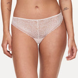 Front view of the Pila Tanga Brief in Talc showing lace detailing and smooth silhouette – available at The Foundation.