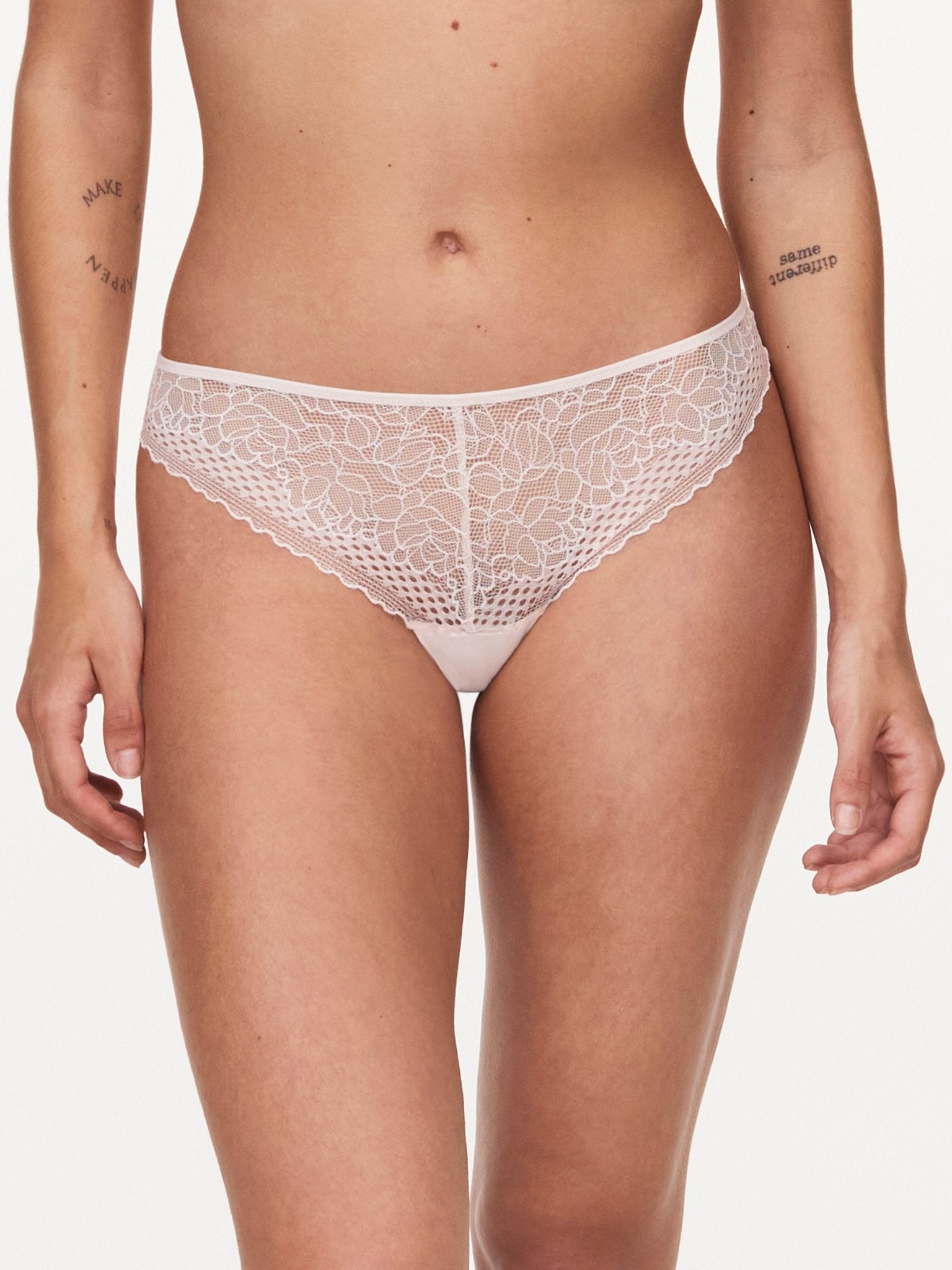 Front view of the Pila Tanga Brief in Talc showing lace detailing and smooth silhouette – available at The Foundation.