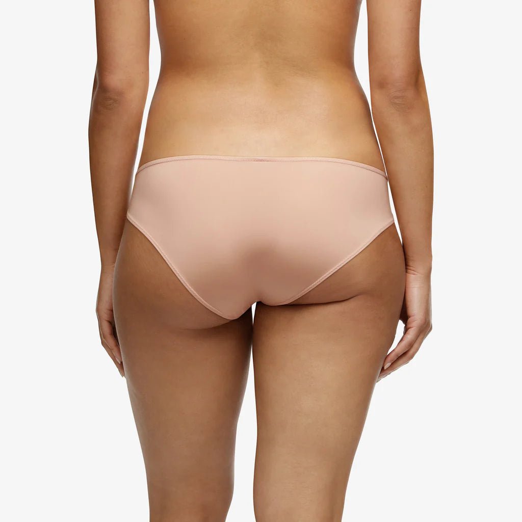 Back view of Maddie Hipster Brief in soft pink showcasing smooth opaque knit design.