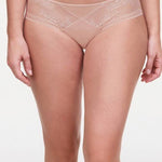 Model wearing Maddie Shorty Brief in Soft Pink with floral lace, striped tulle and opaque knit front.