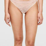 Front view of Passionata Maddie Tanga Brief in soft pink floral lace – The Foundation