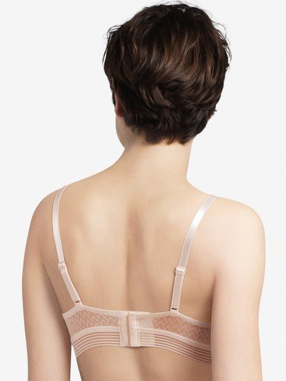 Back view of the Manhattan Non Wire Triangle Bra in Talc, showcasing striped-look band and wireless fit.