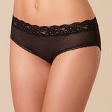 Model wearing Passionata Brooklyn Shorty Brief in Black from The Foundation, featuring lace-trimmed edges, sheer mesh back, and a medium-rise fit. front view