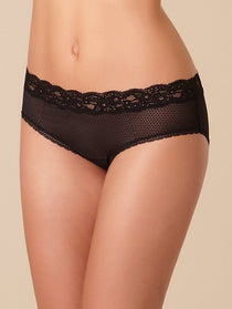 Model wearing Passionata Brooklyn Shorty Brief in Black from The Foundation, featuring lace-trimmed edges, sheer mesh back, and a medium-rise fit. front view