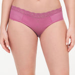 front view of Model wearing the Brooklyn Shorty Brief Gardenia from The Foundation – modest lace-trimmed front with medium rise comfort.