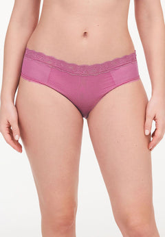 front view of Model wearing the Brooklyn Shorty Brief Gardenia from The Foundation – modest lace-trimmed front with medium rise comfort.