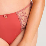 Close up of model wearing Samanta’s Perla Midi Brief in Rosy, lace detail on hips—available at The Foundation Australia.