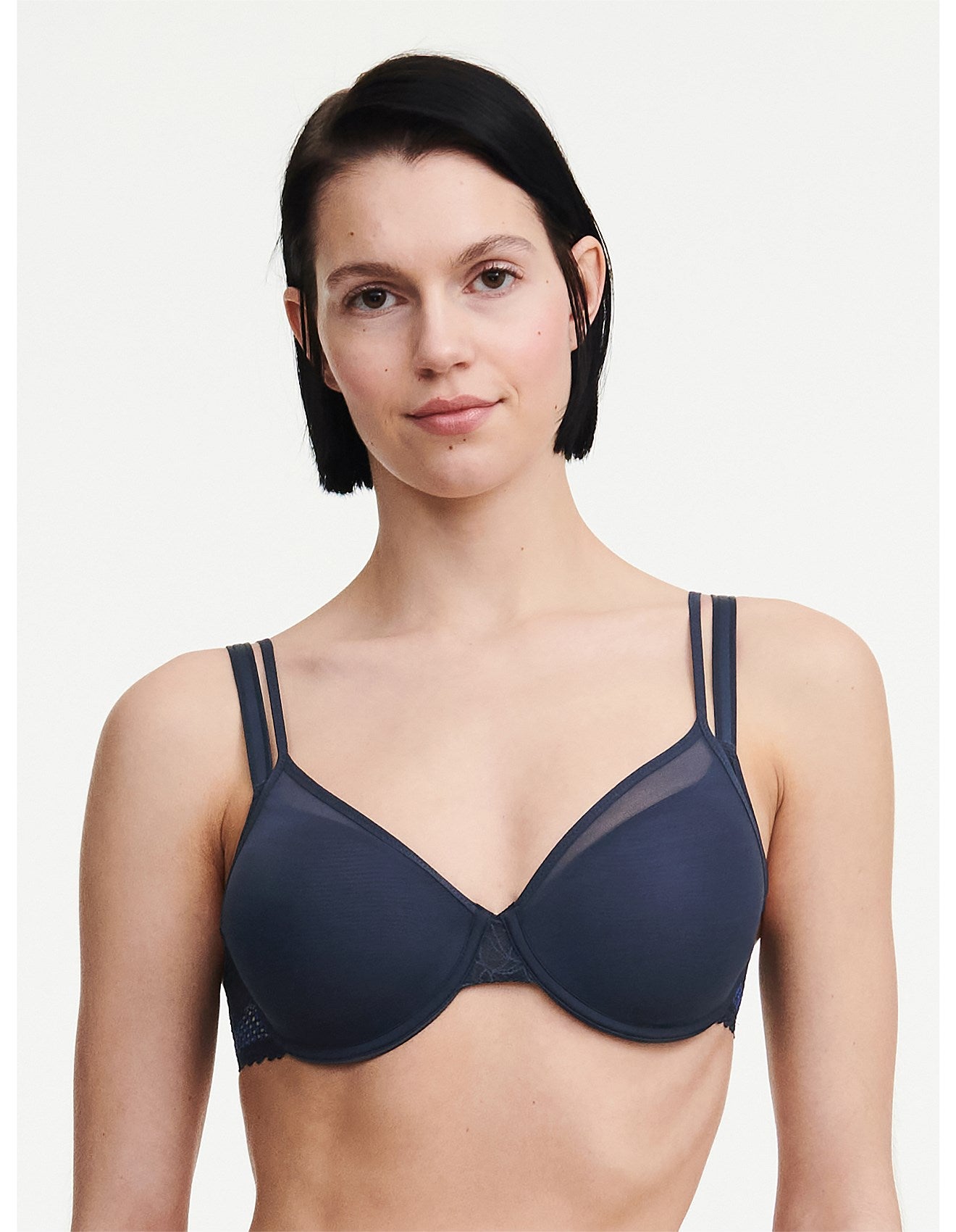 Model wearing the Pila Covering Spacer Bra in Sailing Blue, showcasing its smooth 3D cups and clean neckline for a t-shirt-ready finish.