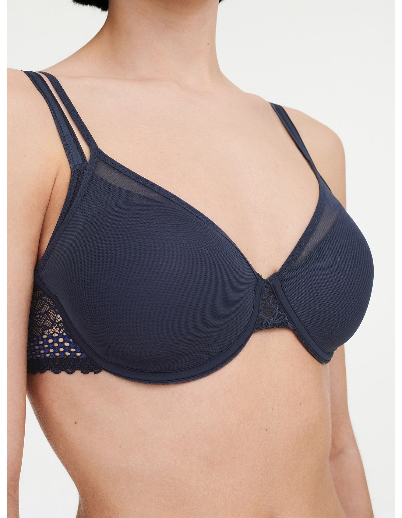 Side profile highlighting the sheer tulle overlay on the molded spacer cups, offering a stylish and breathable layering effect.