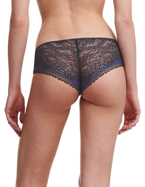 Model showcasing the back of the Pila Shorty Brief in Sailing Blue, featuring semi-sheer lace with a floral design for a chic, feminine touch.