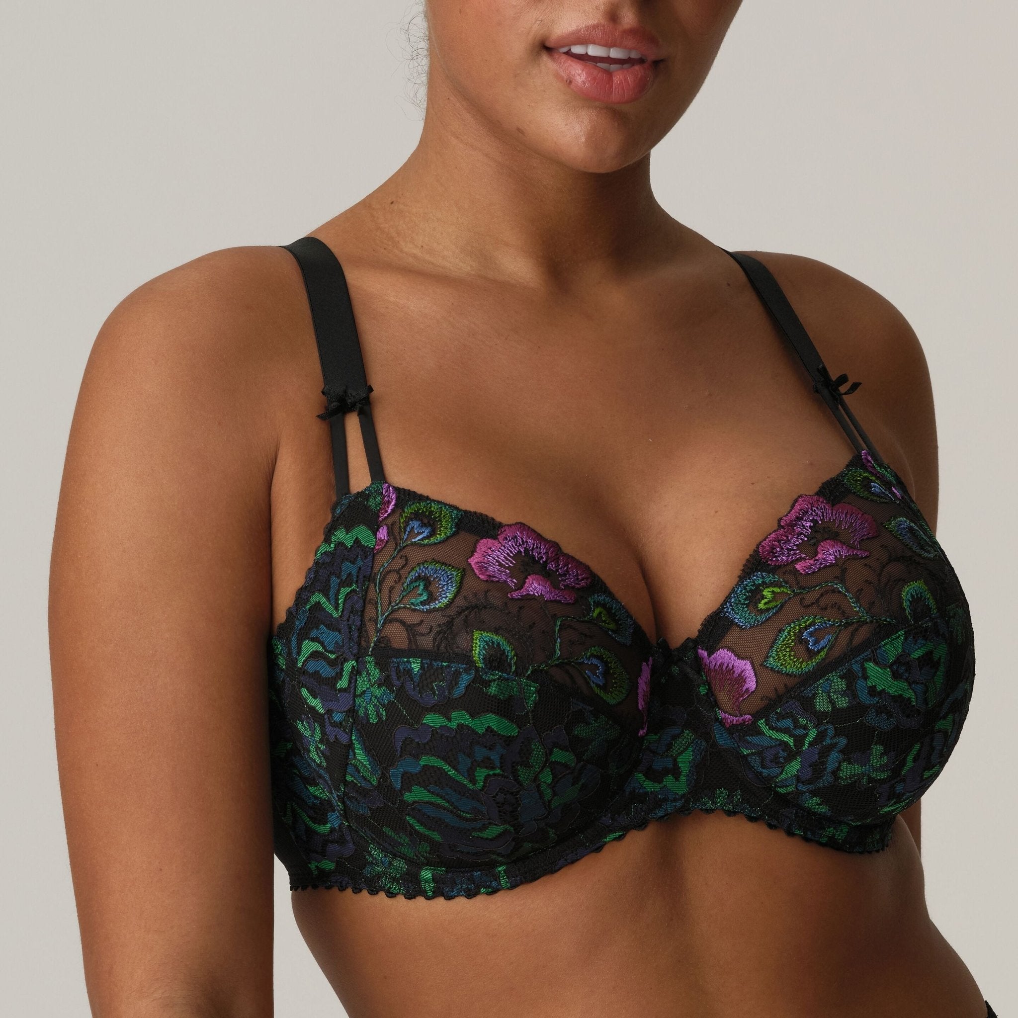 Model wearing San Angel Full Cup Bra Peacock Feather by Prima Donna, front view revealing vibrant colourway and supportive fit from The Foundation.