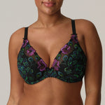 Model wears San Angel Half Padded Plunge Bra Peacock Feather by Prima Donna, full view of lively pink and teal lace, as seen at The Foundation.