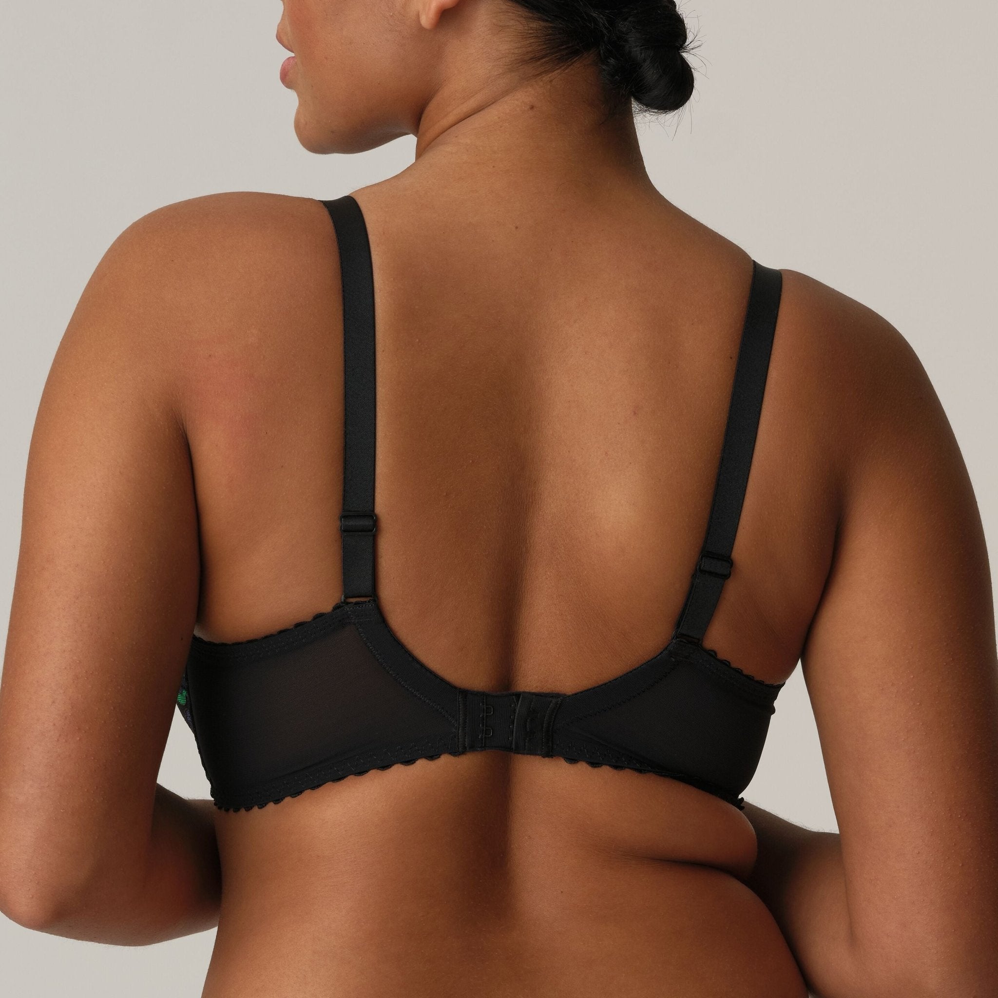 Rear shot of Prima Donna San Angel Half Padded Plunge Bra Peacock Feather, microfibre wings and lace straps resting softly, at The Foundation.