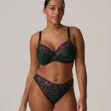 Model in San Angel Thong Brief Peacock Feather by Prima Donna, styled with matching bra, showing blue-green Italian lace at The Foundation.