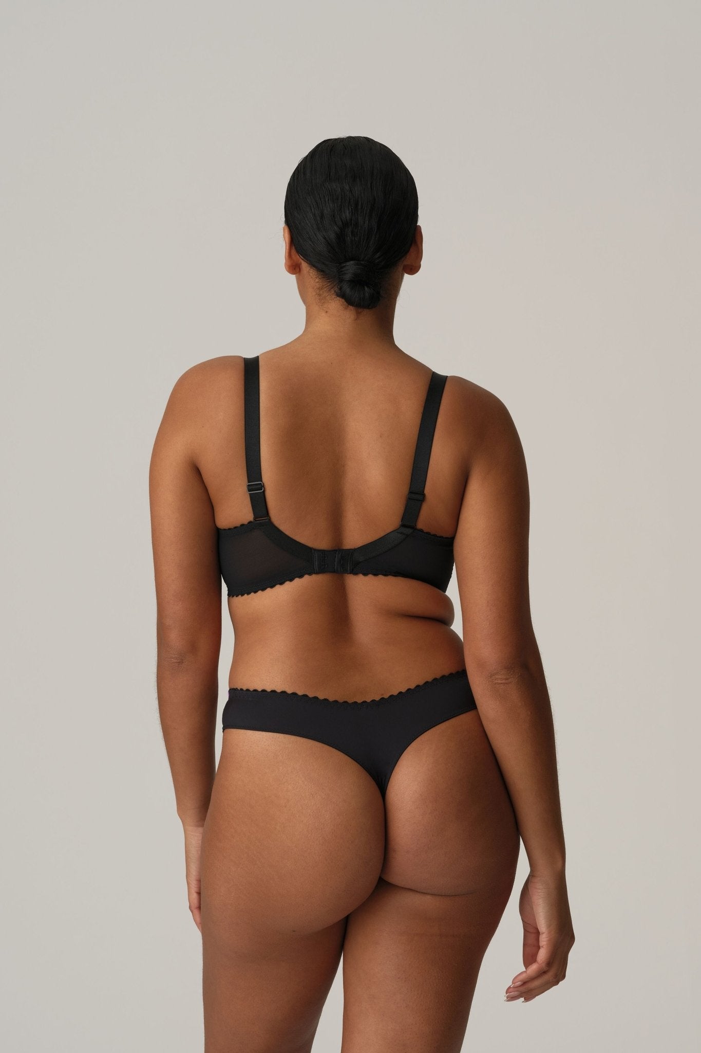 Prima Donna San Angel Thong Brief Peacock Feather, back G-string view, highlighting minimalist fit and designer lace, from The Foundation.