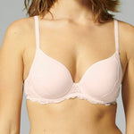 Front view of Reve 3D Plunge Contour Bra Sakura Pink on model, featuring seamless plunge neckline and underwire support