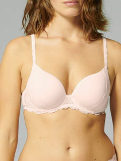 Front view of Reve 3D Plunge Contour Bra Sakura Pink on model, featuring seamless plunge neckline and underwire support