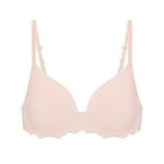 Flat lay of Reve 3D Plunge Contour Bra Sakura Pink, showing smooth cups and scalloped lace trim