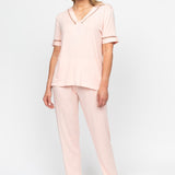 Front view of the Nora Rose Sally Lace-Detail Jersey Pyjama Set, showing V-front button-up top with lace inserts and matching bottoms with shell lace hem.