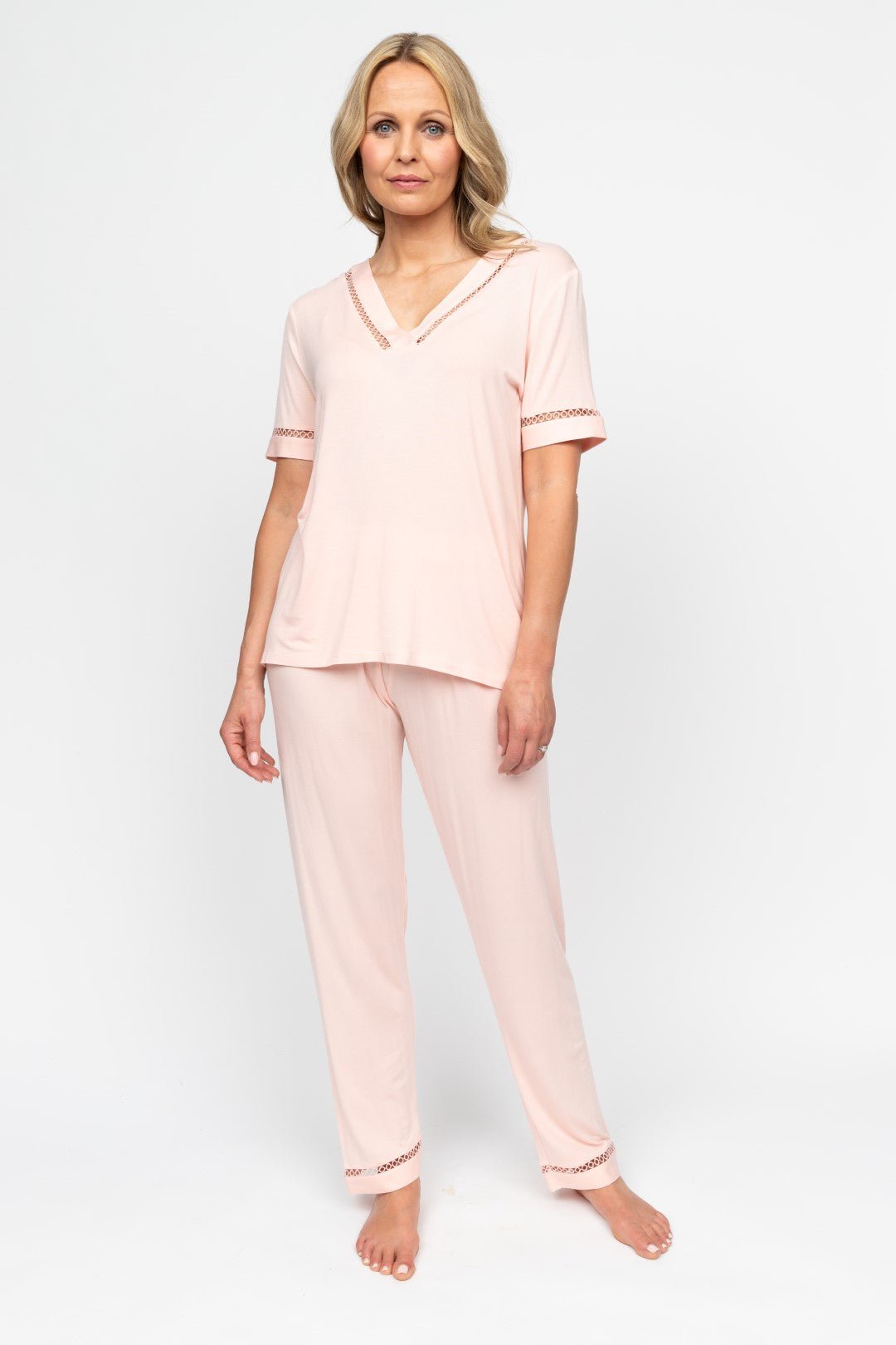 Front view of the Nora Rose Sally Lace-Detail Jersey Pyjama Set, showing V-front button-up top with lace inserts and matching bottoms with shell lace hem.
