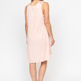 Back view of the Sally Lace-Detail Nightdress, highlighting its relaxed swing fit and gently shaped hem.