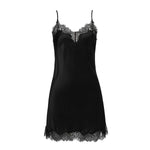 Flat lay of the Scarlett Silk Chemise in black, highlighting the detailed eyelash lace trim and smooth silk texture for luxury loungewear appeal.