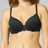 Model in Simone Pérèle Caresse 3D Plunge Contour T-Shirt Bra in Black from The Foundation, featuring breathable spacer cups and lace back detail. front view