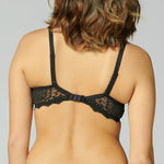 Model in Simone Pérèle Caresse 3D Plunge Contour T-Shirt Bra in Black from The Foundation, featuring breathable spacer cups and lace back detail. back view