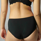 Back view of the Caresse Brief in Black, highlighting smoothing microfibre back and full coverage fit.