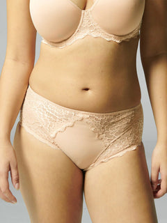 Close up of Simone Pérèle Caresse Culotte Brief in Peau Rose, shown on model, featuring full coverage lace and silky microfibre front.