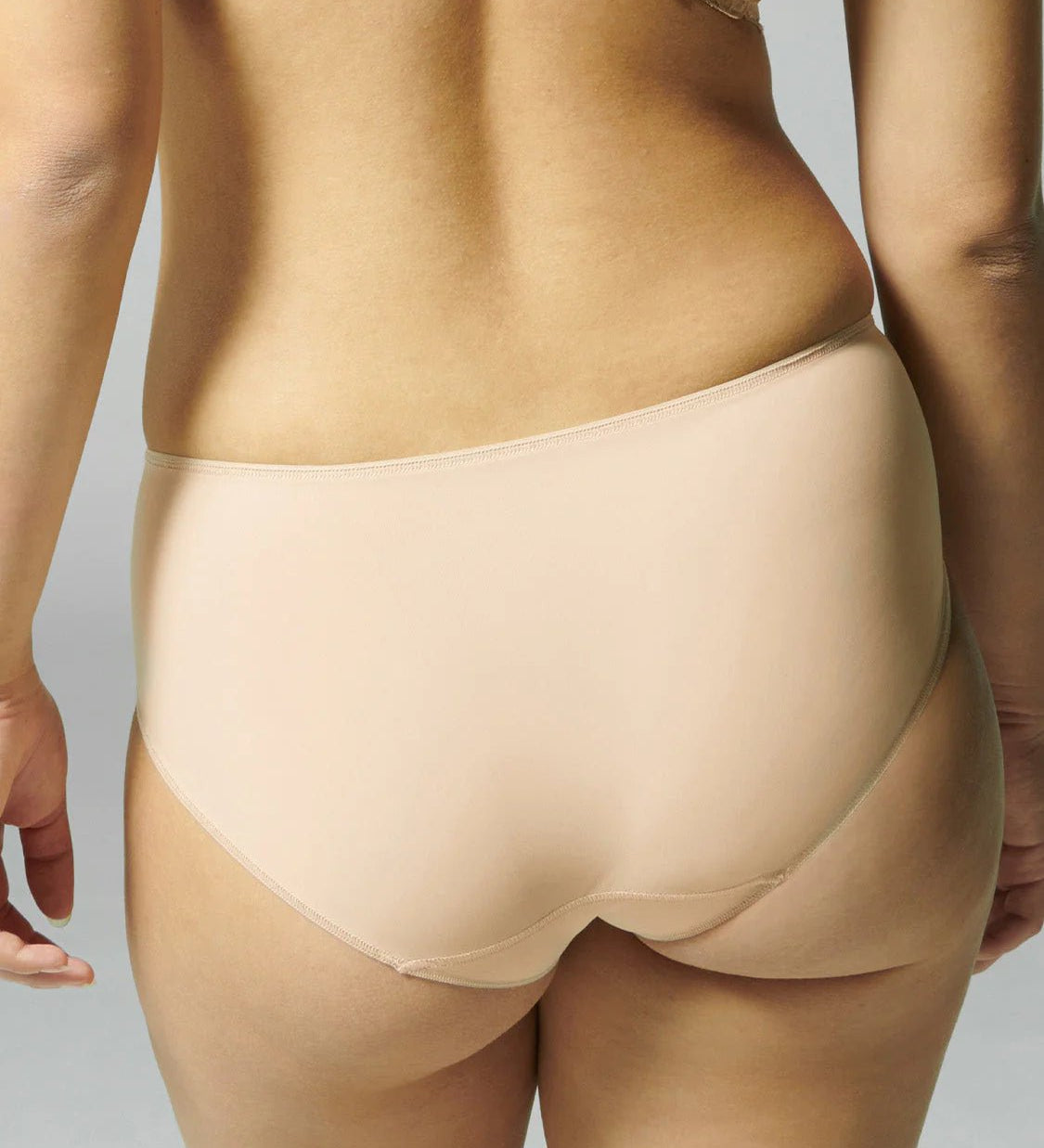 Back view of Caresse Brief in Peau Rose, showcasing smooth microfibre back panel and soft stretch waistband.
