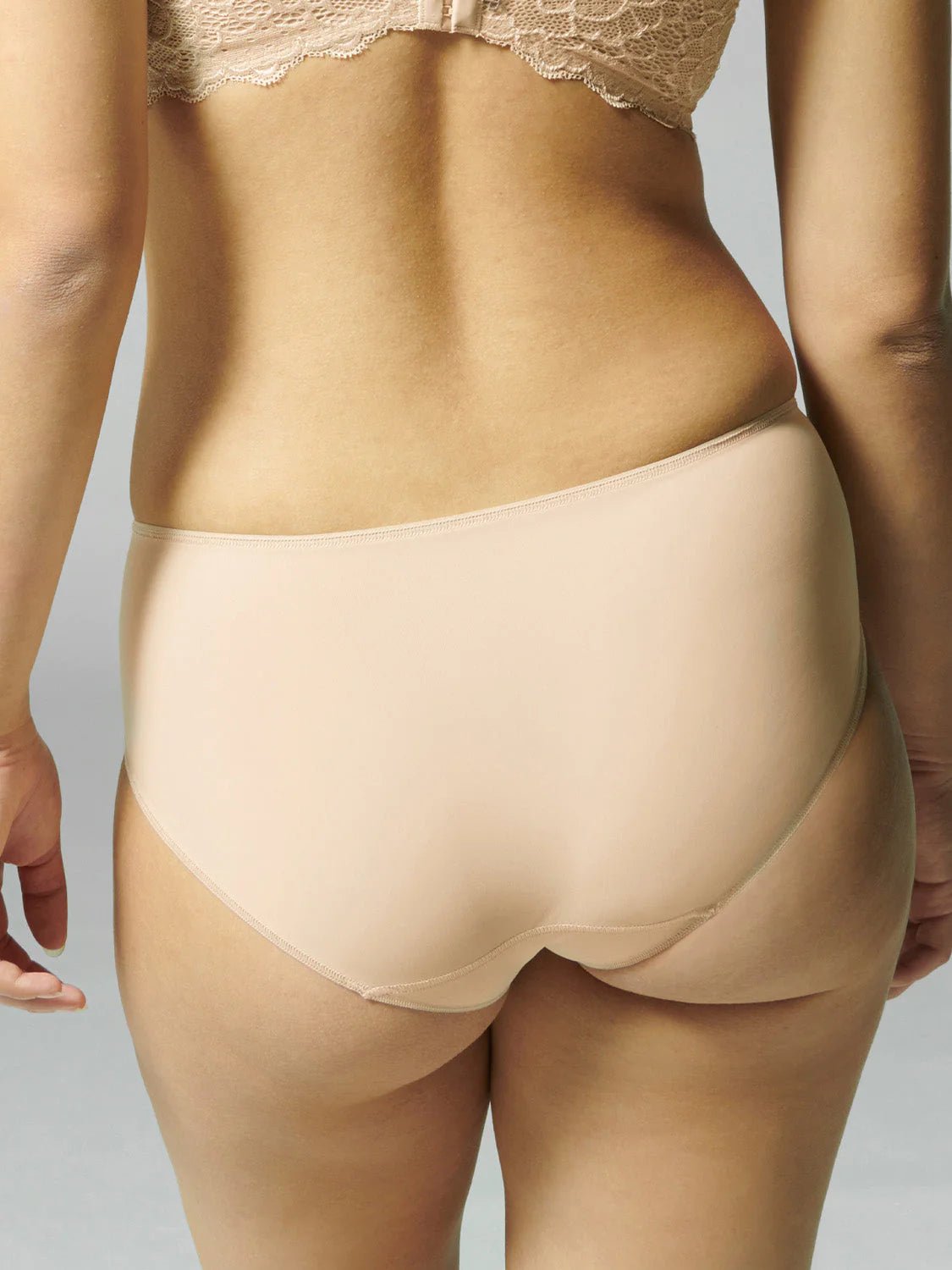 Back view of Caresse Brief in Peau Rose, showcasing smooth microfibre back panel and soft stretch waistband.
