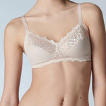 Model in Simone Perele Caresse Soft Cup Bra Peau Rose with lace detail—The Foundation